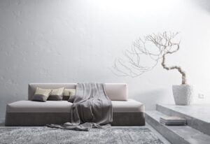 Przytulna i modna aranżacja salonu w odcieniach szarości: jasne wnętrze pełne uroku